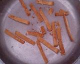 A picture of step 2 of Cheesy Savoury Crisp from Leftover Sandwich Crusts.