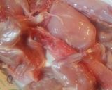 A picture of step 1 of Fried Rabbit in a cast iron skillet.