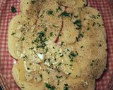 Foto del paso 7 de la receta Merluza del pincho al horno, con patatas y ajos
