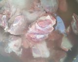A picture of step 1 of Alloo gosht.