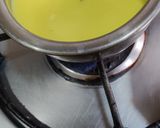 A picture of step 1 of Turmeric Cardamom Milk.