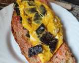 Foto del paso 3 de la receta: Tortilla francesa con bull negro y pan con tomate al punto picante