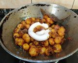 A picture of step 9 of ALOO DO PYAZA..