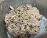 A picture of step 3 of Ragi rotti with drumstick leaves.