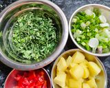 A picture of step 1 of Spring onion, Methi and Alu sabzi.