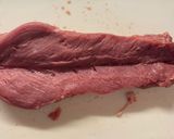 A picture of step 9 of Prosciutto wrapped pork fillet with chorizo stuffing.