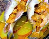 Foto del paso 12 de la receta: Dorada al horno con langostinos macerados y patatas guisadas