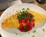 A picture of step 8 of Omurice.