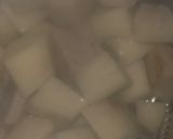 A picture of step 1 of White yam and tomato sauce.