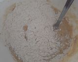 A picture of step 2 of Banana bread with raisins and nuts.