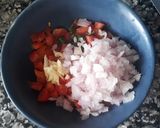 A picture of step 4 of Ragi tacos with paneer and corn filling.