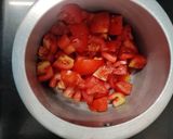 A picture of step 1 of Tomato Soup with sauteed garlic vegetables.