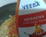 A picture of step 1 of Cheesy Rice Capsicum.