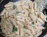 A picture of step 14 of Penne Pasta in Pumpkin Sauce.