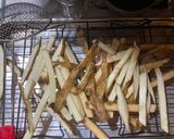 A picture of step 4 of Deep Fried Belgian-Style Potato Fries.