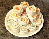 A picture of step 8 of Snack rolls from toasted bread.
