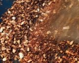 A picture of step 1 of Ulli theeyyal (shallots cooked in roasted coconut gravy and tamarind juice).