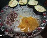 A picture of step 3 of Stuff Brinjal with potato wedges.