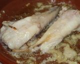 A picture of step 2 of Monkfish Tails with Shrimp and Clams in Sauce.