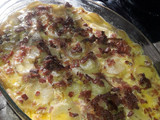 Mil hojas de papas, crema y jamón crudo