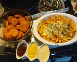 Foto del paso 4 de la receta: Papitas y nuggets sin grasa, un antojito de Domingo
