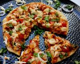 A picture of step 4 of Cheesy Chapati Pizza.