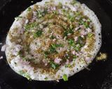 A picture of step 3 of Moringa powder onion dosa.
