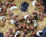 A picture of step 2 of Instant Moong badam pistachio dal halwa.