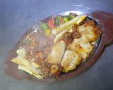 A picture of step 18 of Sizzling Seafood Platter.
