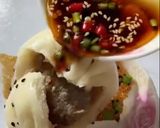 A picture of step 9 of Pan-Fried Bao Zi.