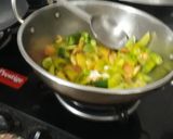 A picture of step 1 of Green Tomato and green chilli ki khatti mithi chutney.