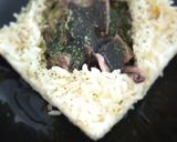 Foto del paso 9 de la receta: Calamares de Potera en su Tinta con Arroz Blanco de Grano Largo