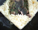 Foto del paso 9 de la receta: Calamares de Potera en su Tinta con Arroz Blanco de Grano Largo