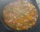 A picture of step 5 of Paella with Fresh Fava Beans and Pods.