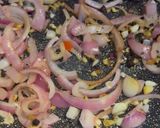 A picture of step 2 of Rice and locust (formented) beans.