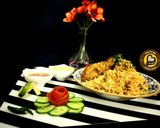 A picture of step 14 of Delhi's layered chicken Dum Biryani.