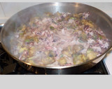 Foto del paso 20 de la receta: Puntilla con alcachofas y ajos tiernos
