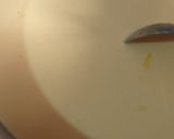 A picture of step 2 of Custard with orange jelly.