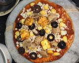 A picture of step 9 of Veggie Loaded Pizza and Mushroom And Paneer Pizza Thin Crust.