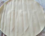 A picture of step 1 of Parma ham and smoked cheese roll up pie.
