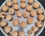 A picture of step 4 of Sooji coconut ladoo.