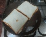 A picture of step 2 of Chicken and eggs cheese sandwiches with french fries.