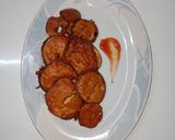 A picture of step 7 of Baingan Ke pakoray.