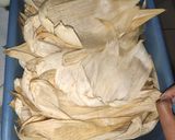 A picture of step 3 of Green Salsa Tamales with Hoja Santa Leaves.