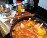 A picture of step 4 of Cajun seafood and crab boil.