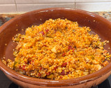 Foto del paso 4 de la receta: Arroz meloso de pulpo y gambones al ajillo