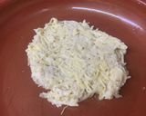 A picture of step 5 of Harissa cod on a rosti served with ratatouille.