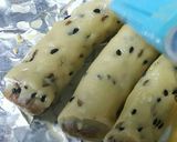 صورة لخطوة 9 من وصفة اصابع التمر بالسمسم طعم ولا ارروع 😋😋😋