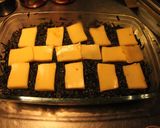 Foto del paso 8 de la receta: Repollo negro queseado y pollo con ajo y koli rabo horneados