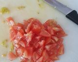 A picture of step 3 of Indian style scrambled eggs.